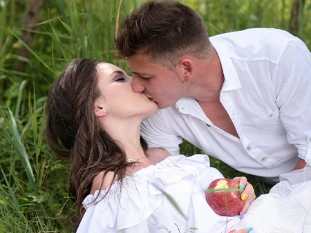 French kiss for beginners showing a couple sharing a gentle romantic kiss